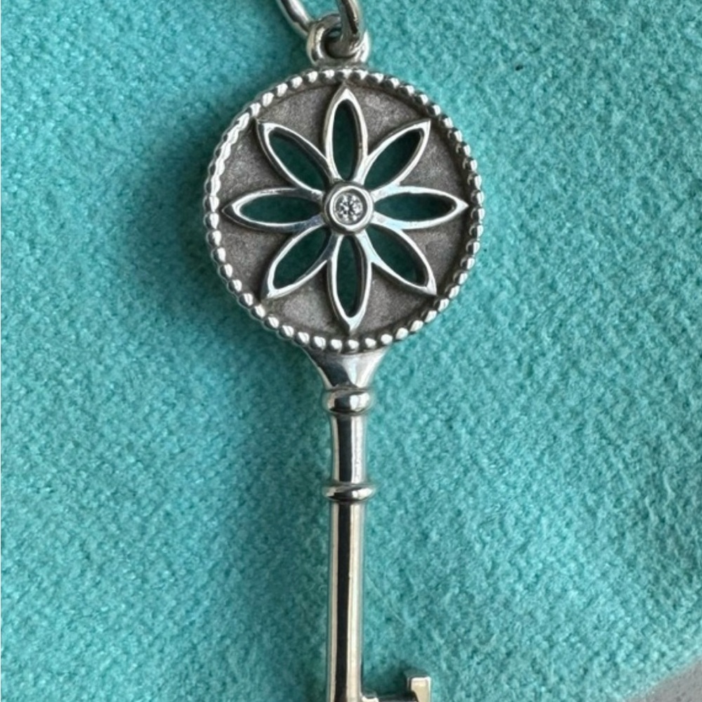 Tiffany & Co. Silver Daisy and diamond pendant